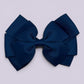 Navy blue pinwheel school hair bow clip