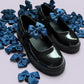Navy blue shoe bows on school shoes