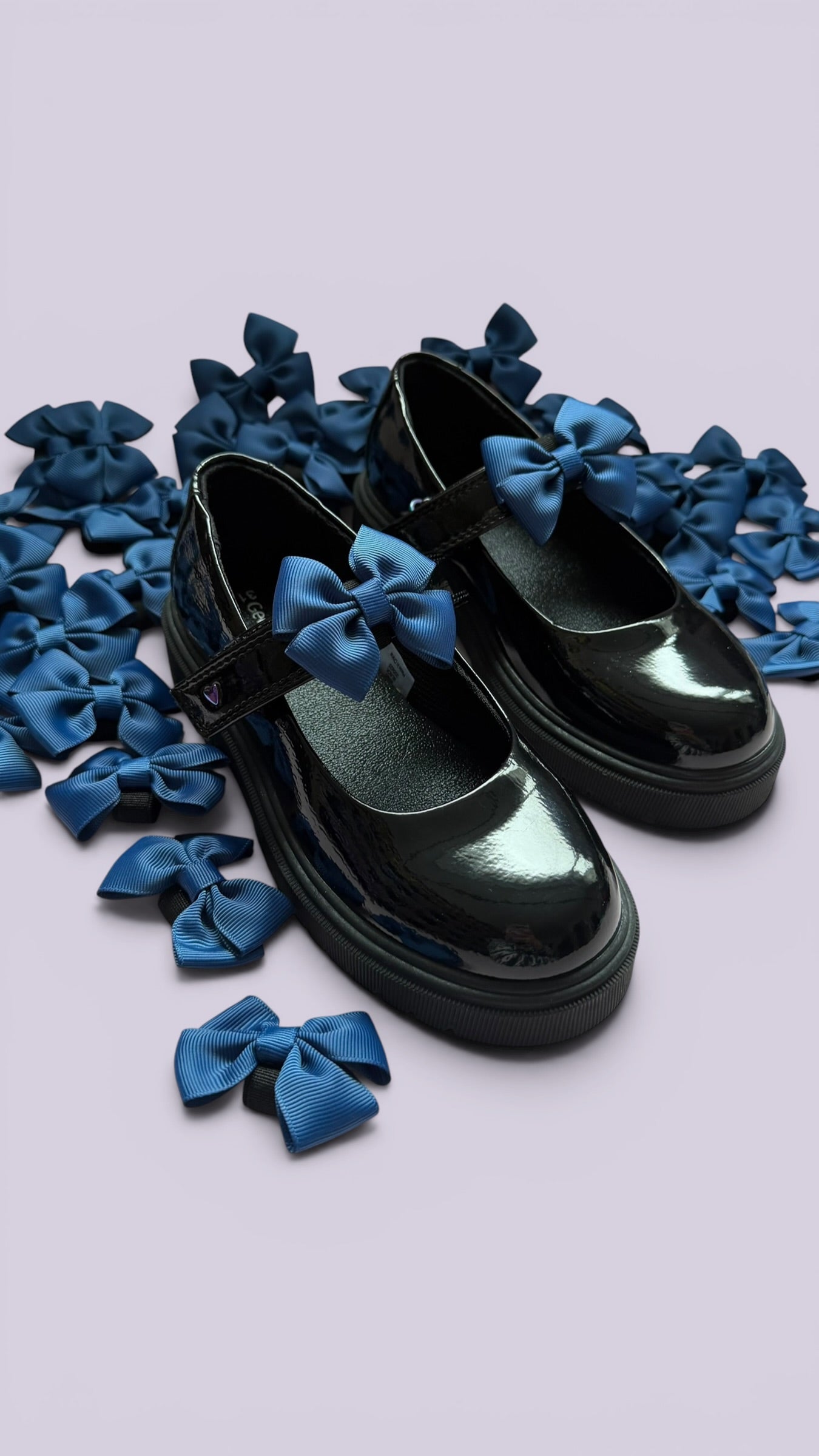 Navy blue shoe bows on school shoes