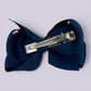 Navy blue small bow clip on card