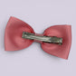 Pink gingham bowtie bow clip on card
