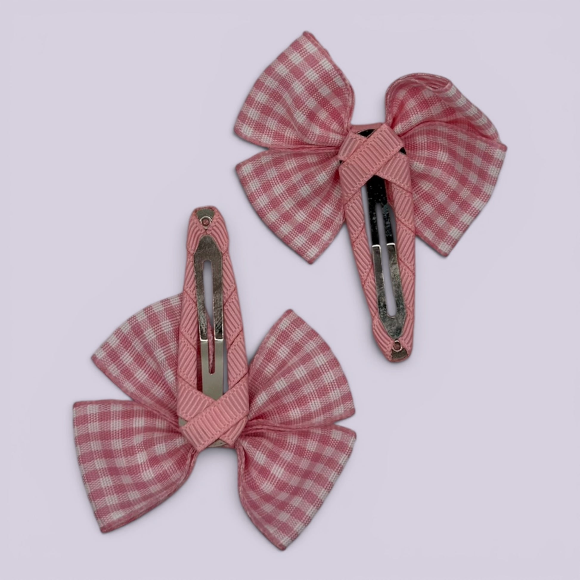 Pink gingham butterfly snap clips on card