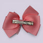 Pink gingham pinwheel bow clip on card