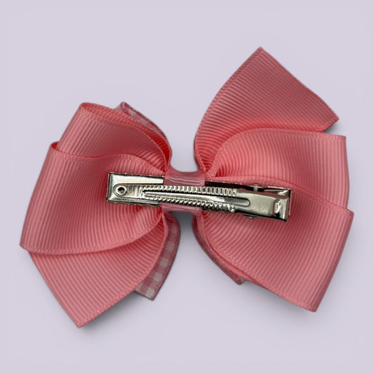 Pink gingham pinwheel bow clip on card