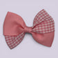 Pink gingham twisted school hair bow clip