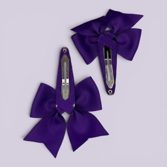 Purple butterfly snap clips on card