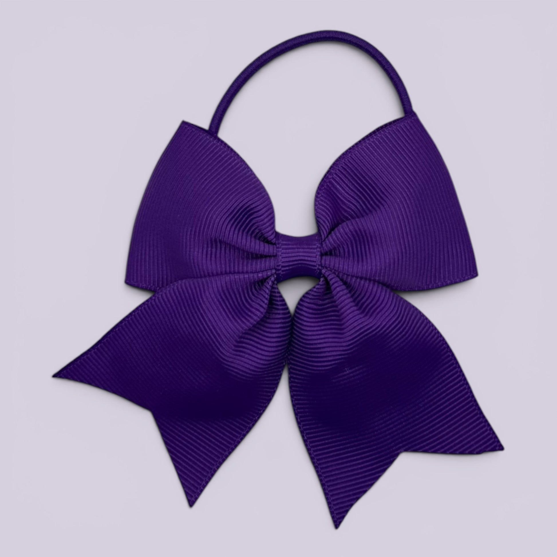 Purple four tailed school hair bow bobble