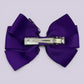 Purple gingham pinwheel bow clip on card