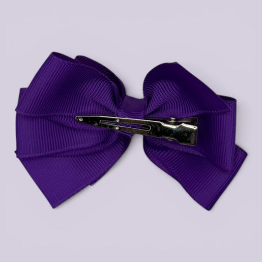 Purple pinwheel bow clip on card