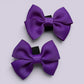 Purple shoe bows close up