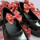 Red gingham school uniform shoe bows