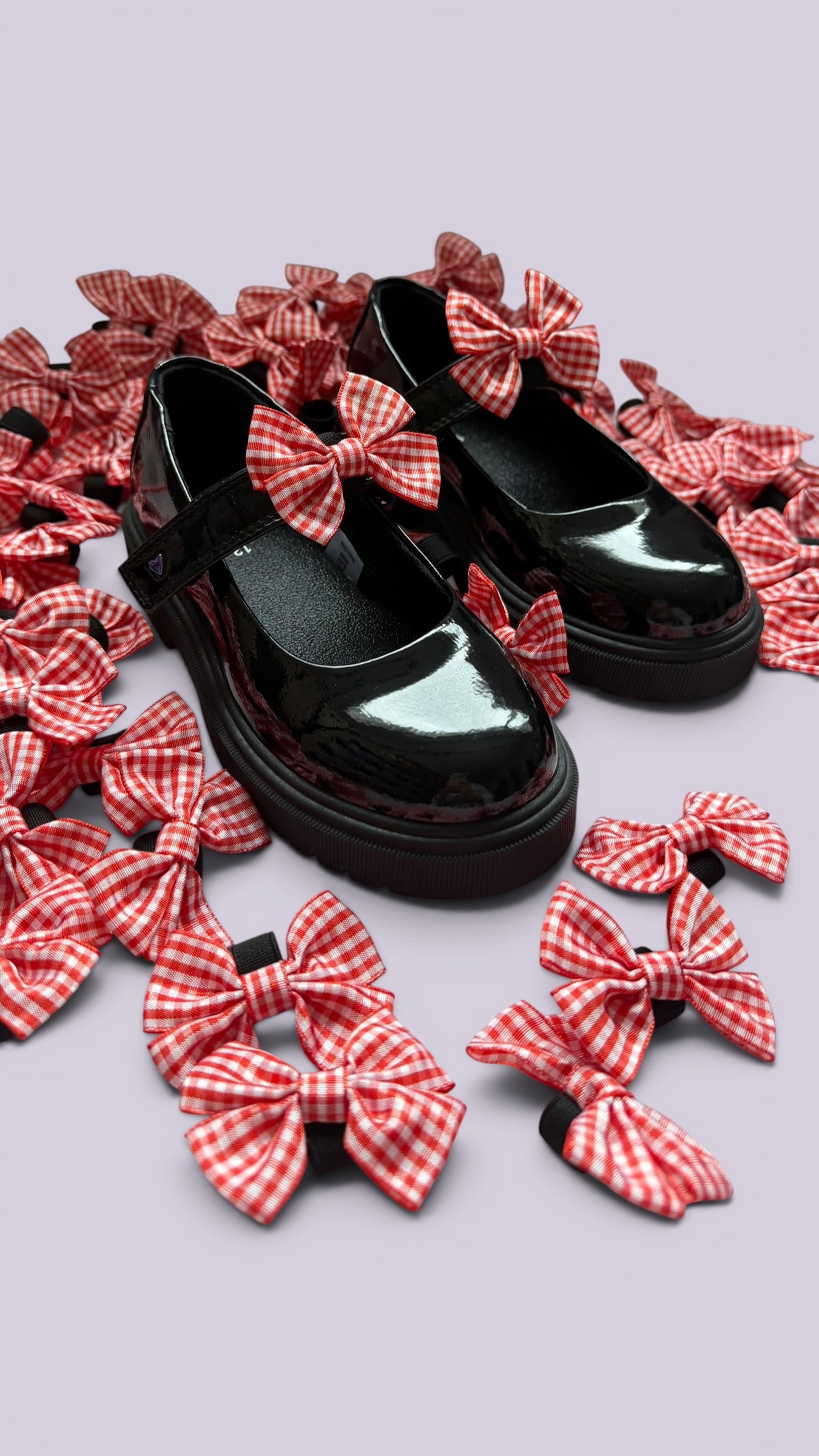 Red gingham shoe bows on school shoes