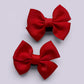 Red shoe bows close up