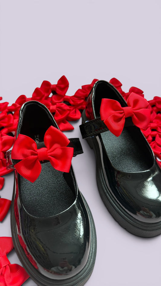 Red school uniform shoe bows