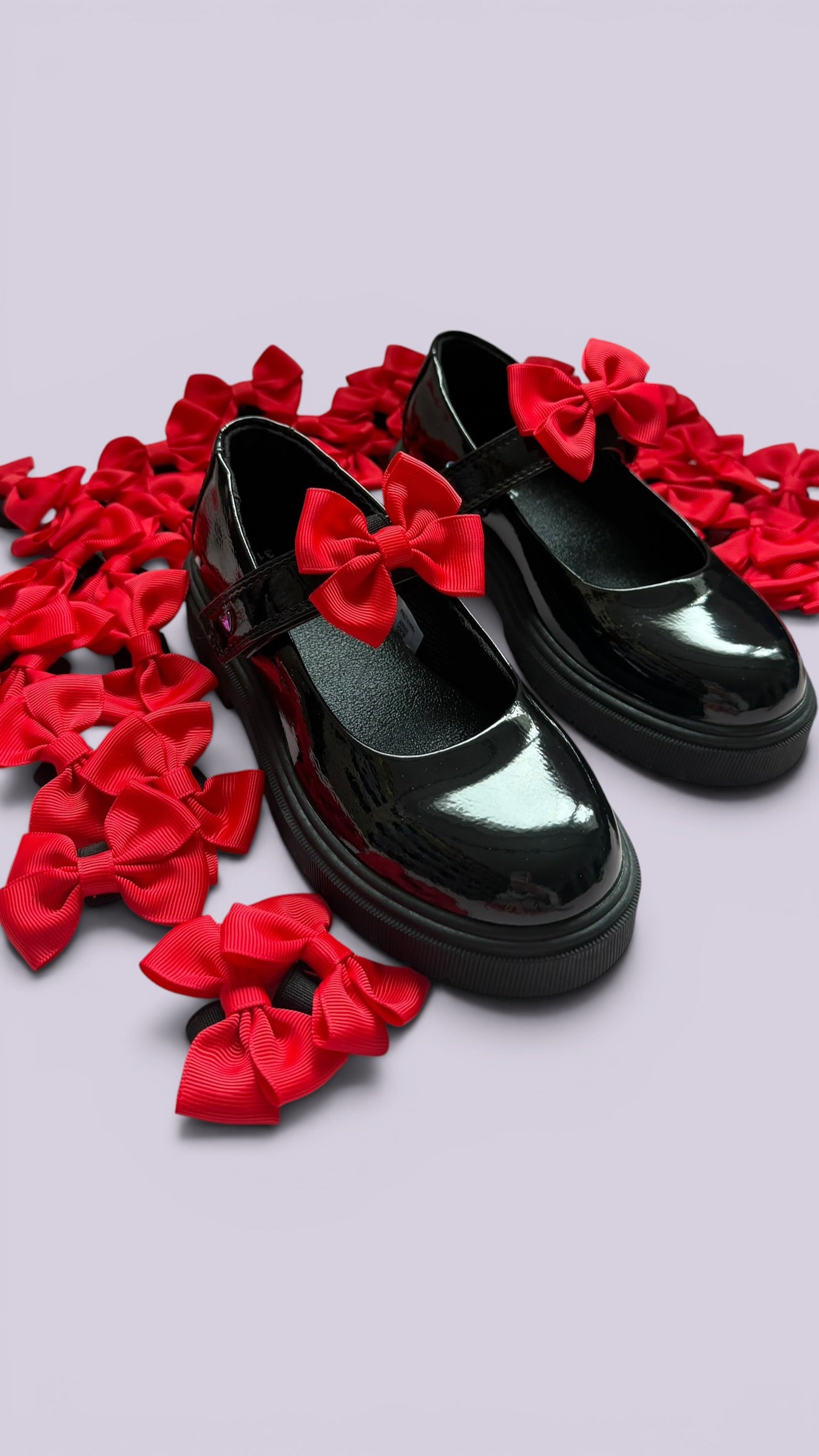 Red shoe bows on school shoes
