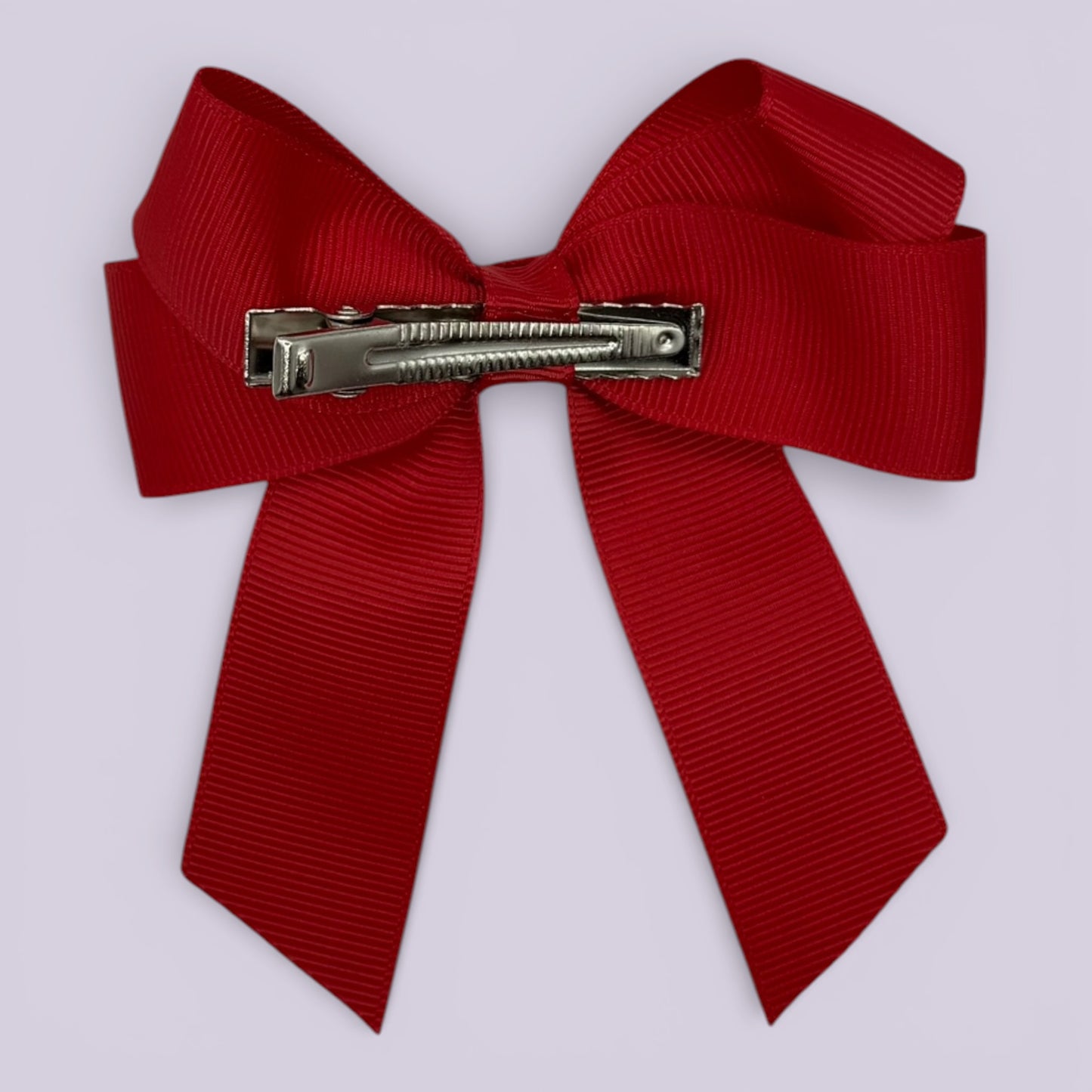 Red tailed bow clip on card