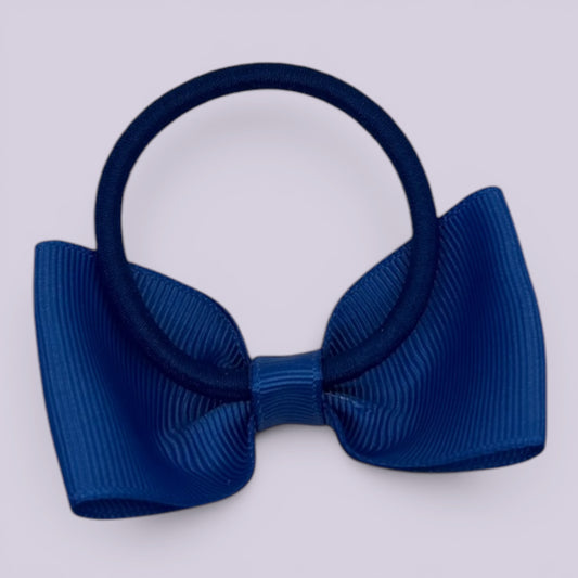 Royal blue bowtie bow bobble on card