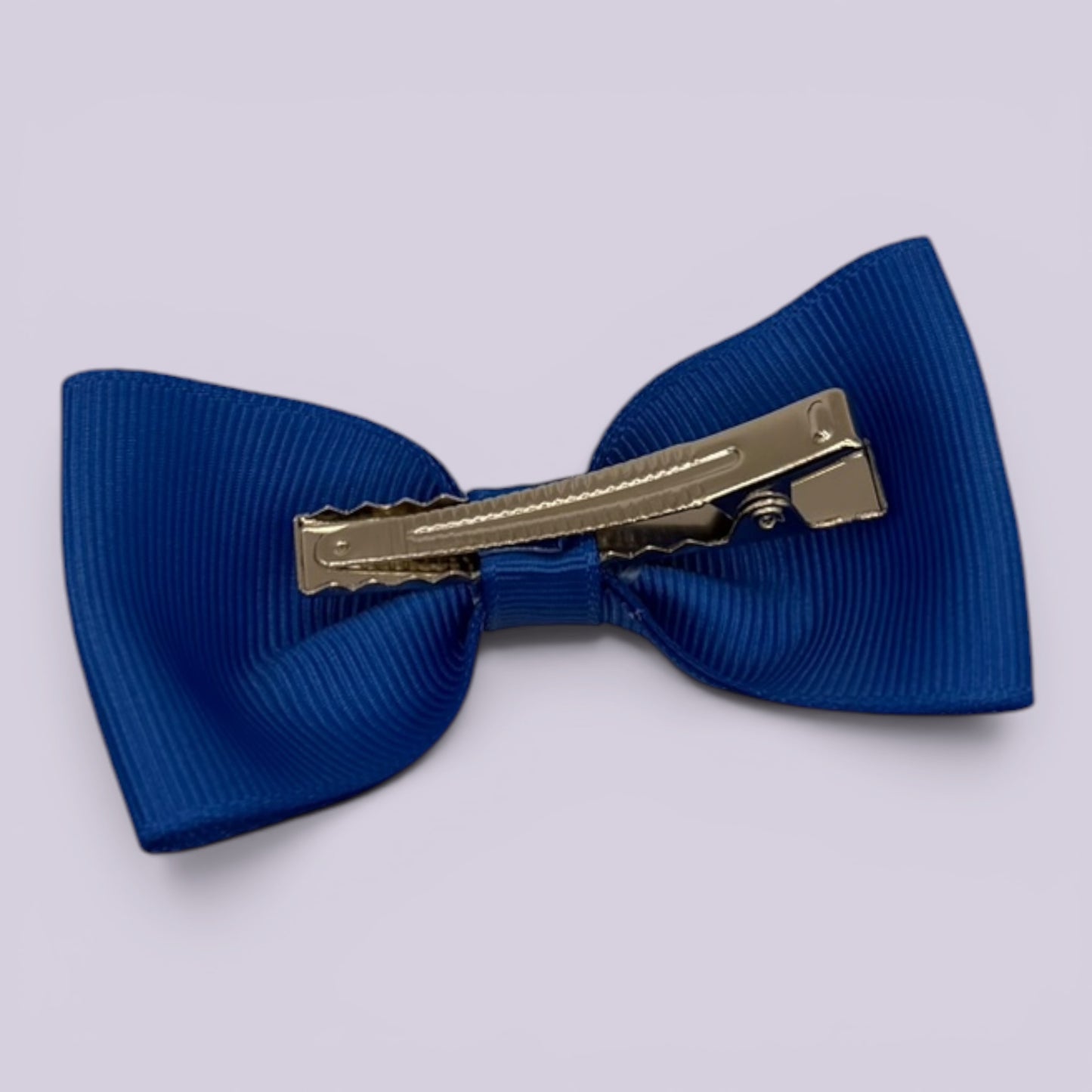 Royal blue bowtie bow clip on card