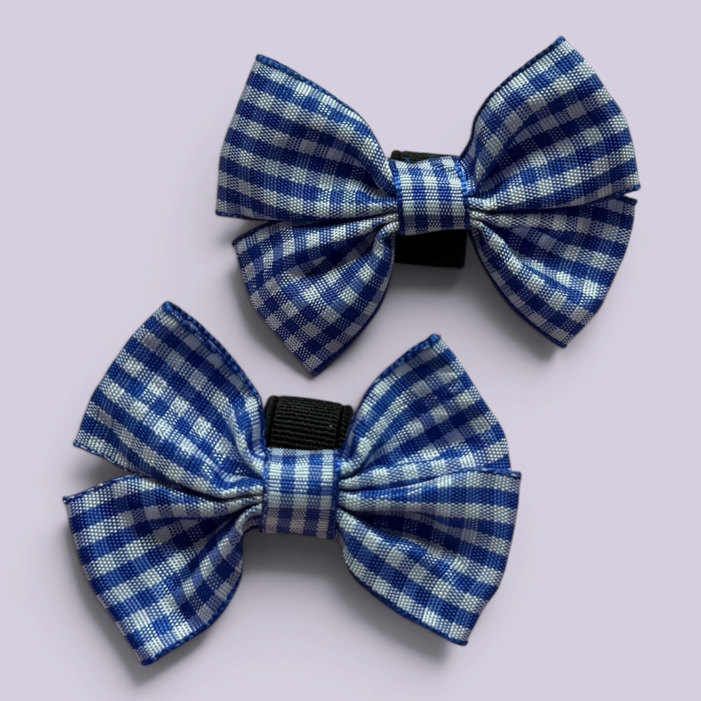 Royal blue gingham shoe bows close up