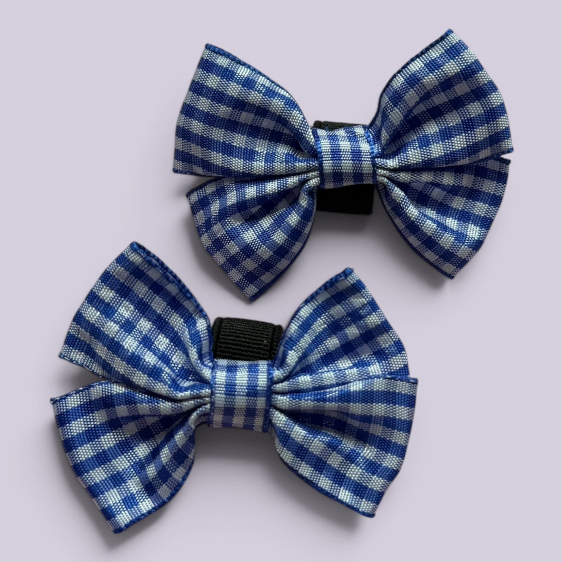 Royal blue gingham shoe bows close up