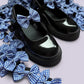 Royal blue gingham shoe bows on school shoes