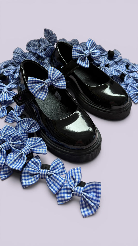 Royal blue gingham shoe bows on school shoes