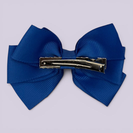 Royal blue pinwheel bow clip on card