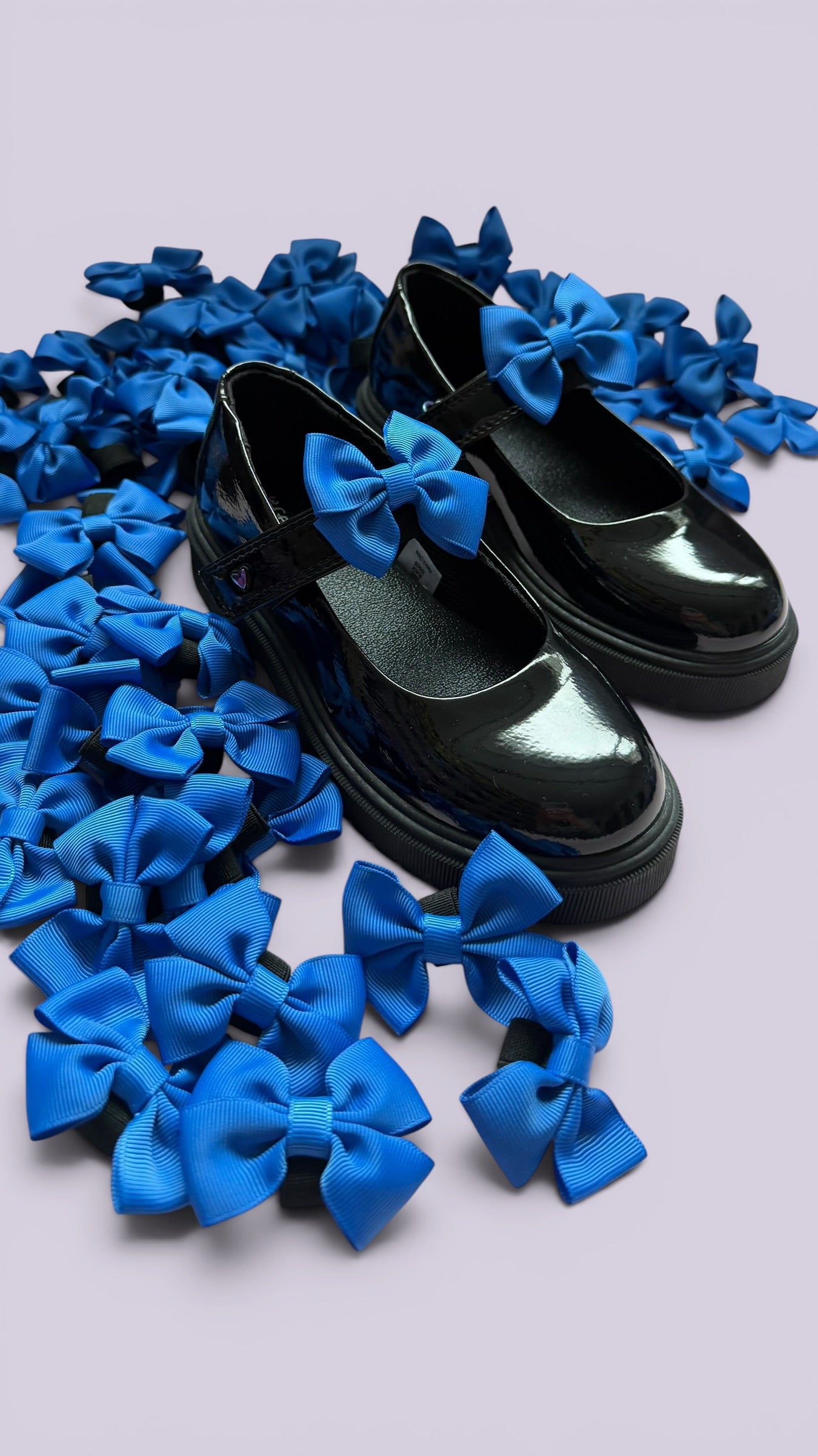 Royal blue shoe bows on school shoes