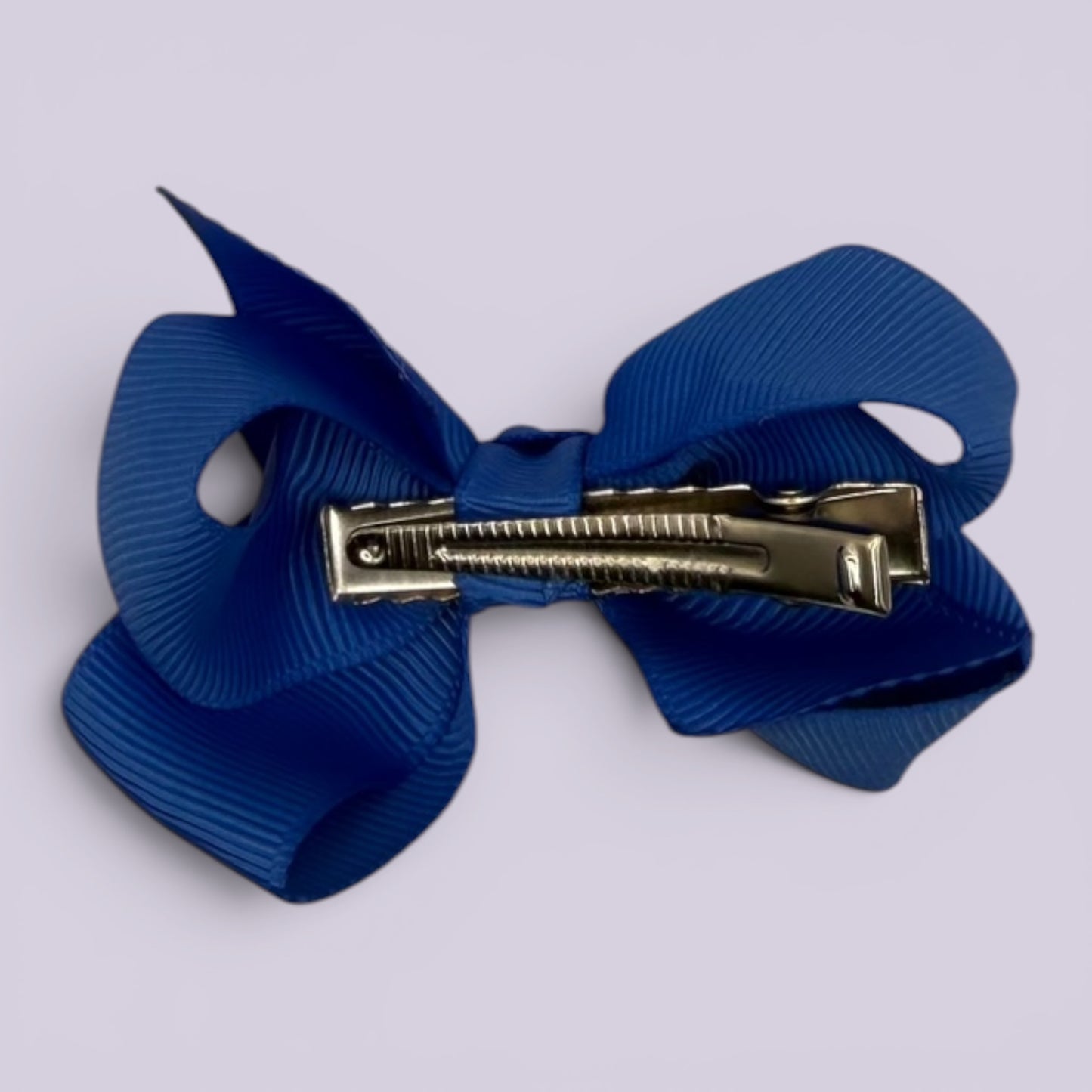 Royal blue small bow clip on card