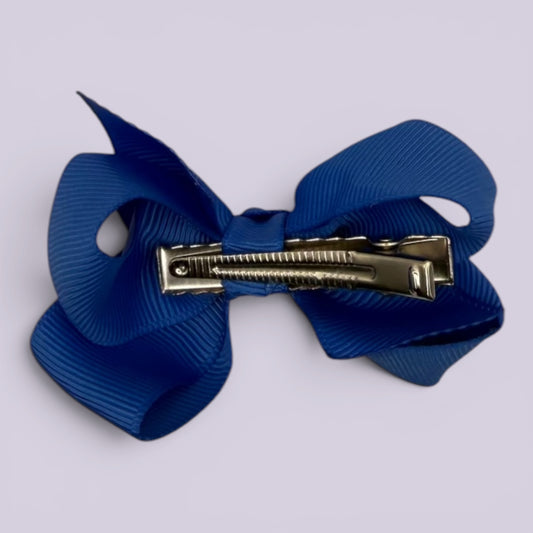 Royal blue small bow clip on card