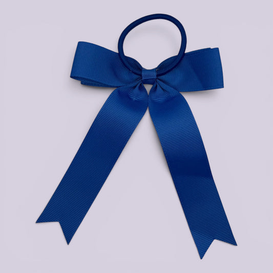 Royal blue tailed bow bobble on card