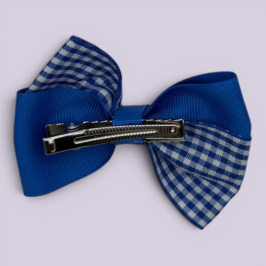 Royal blue gingham twisted bow clip on card