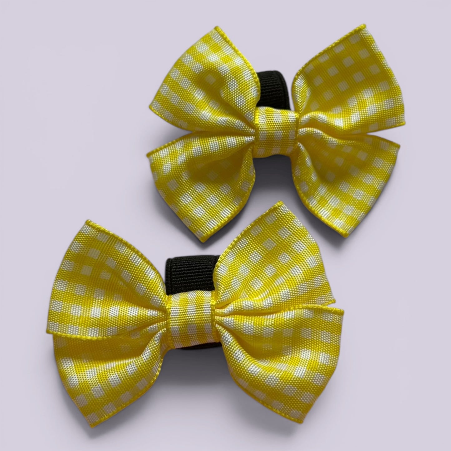 Yellow gingham shoe bows close up