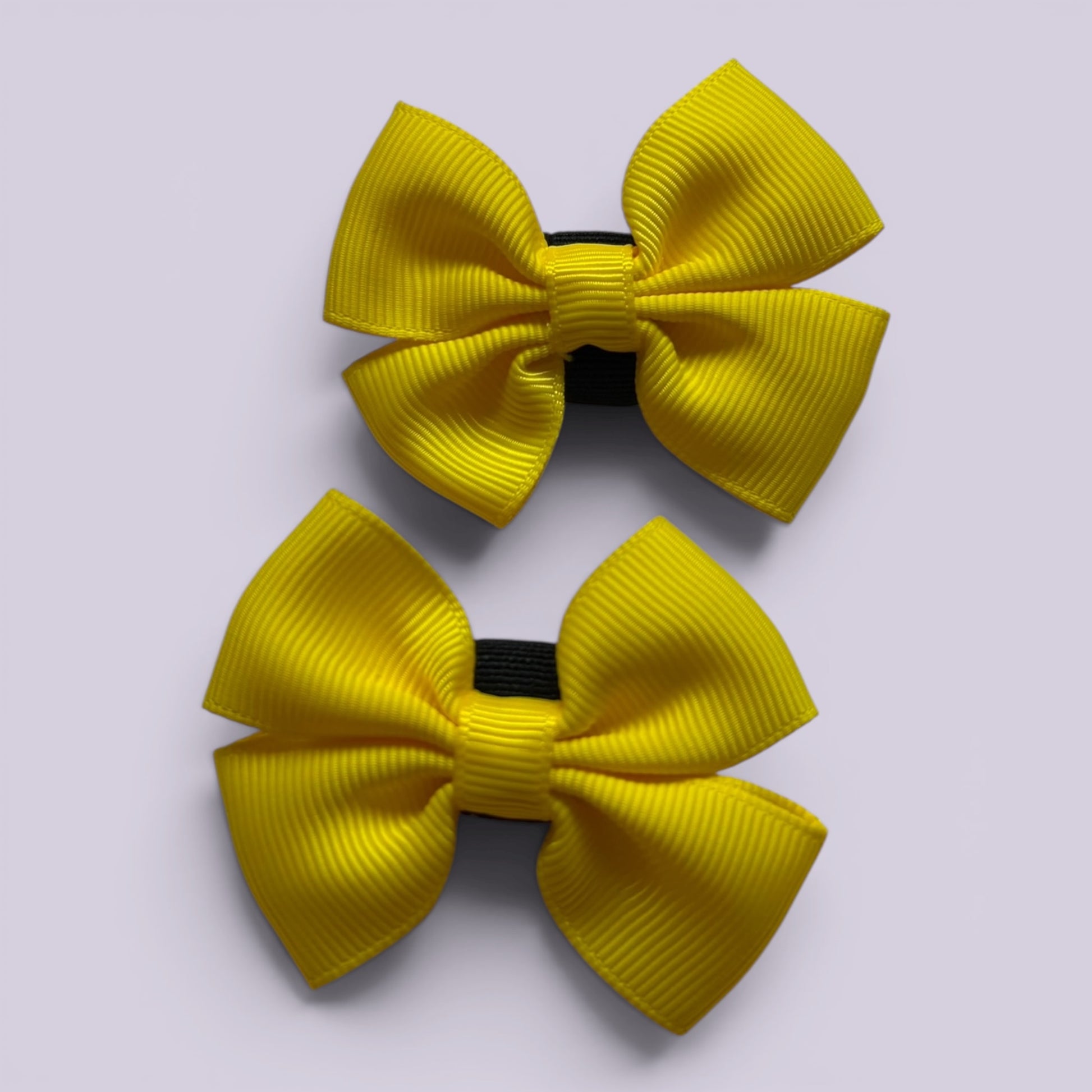 Yellow shoe bows close up