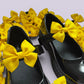 Yellow school uniform shoe bows