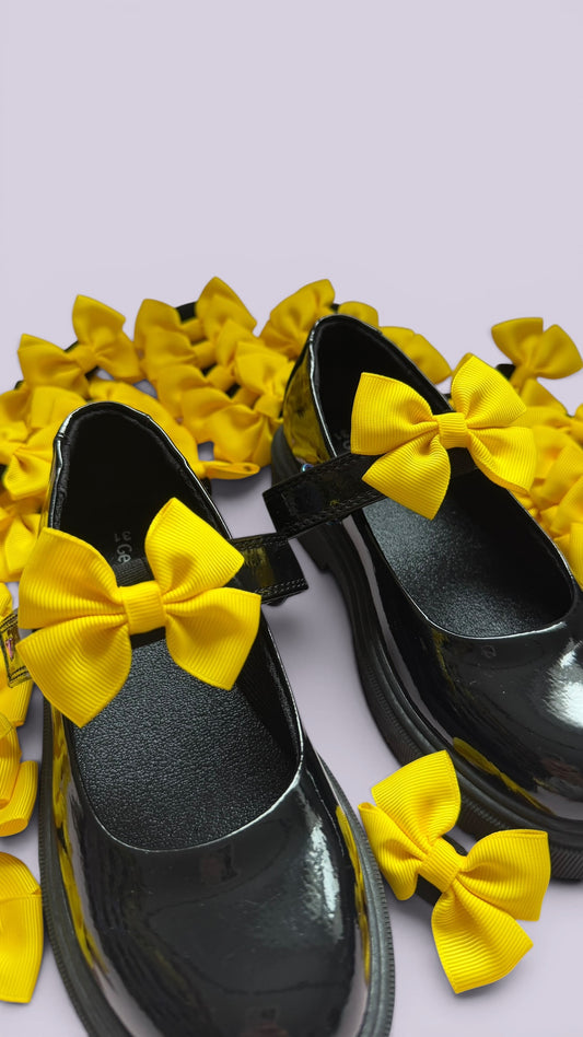 Yellow school uniform shoe bows
