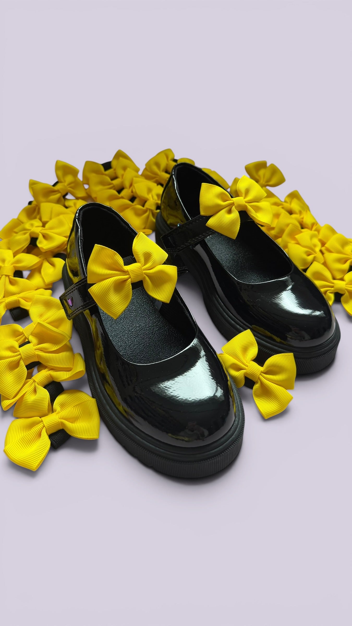 Yellow shoe bows on school shoes